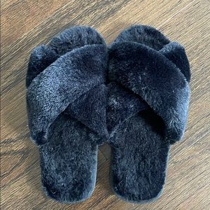 Black crisscross slippers